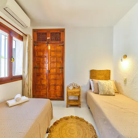 Can Santosha Villa *